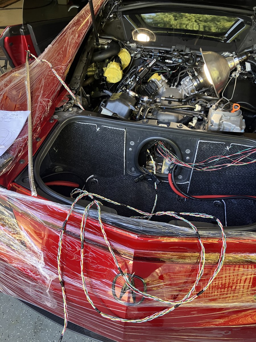 Custom wiring harness under construction in the NSX trunk
